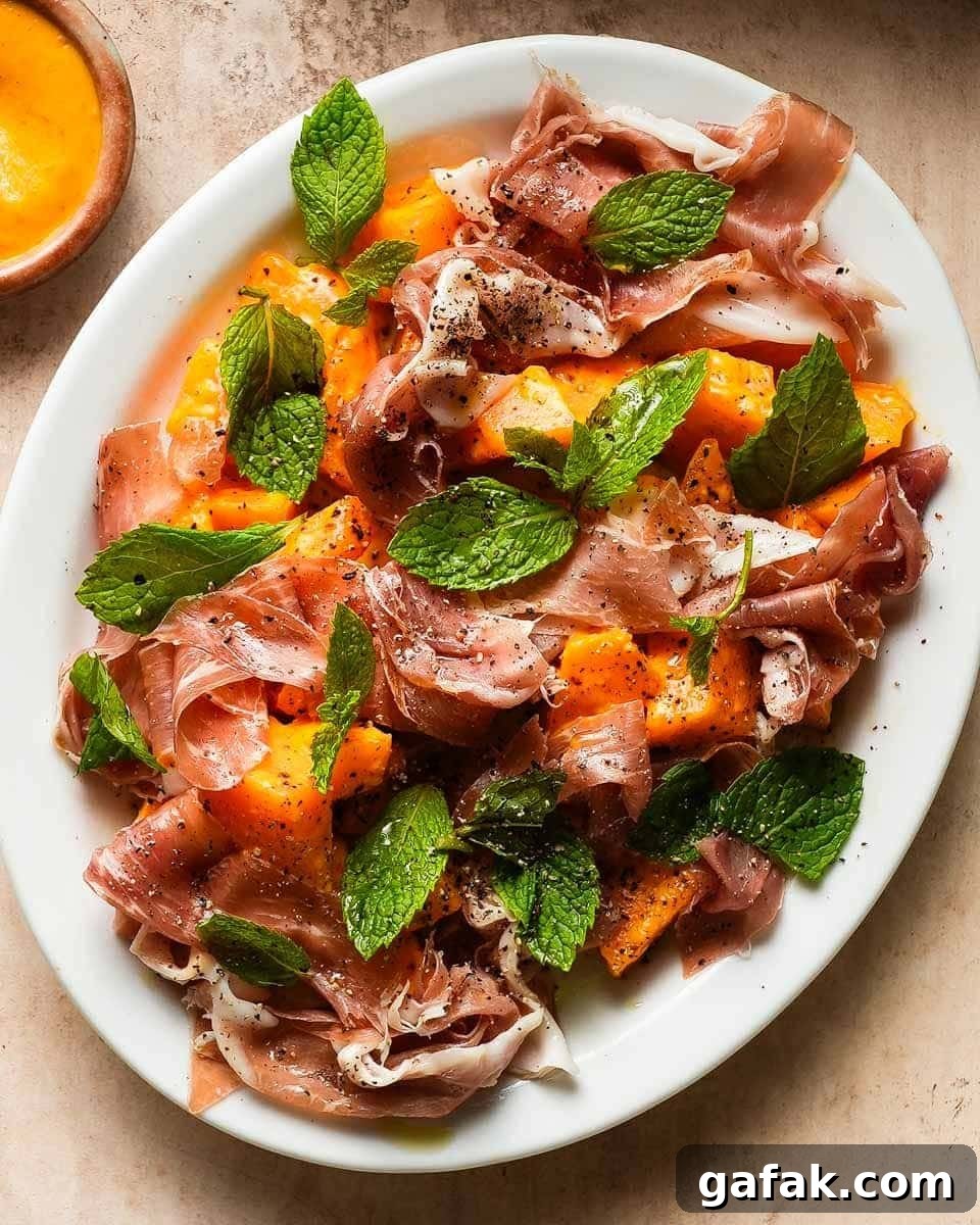 a large plate filled with melon salad