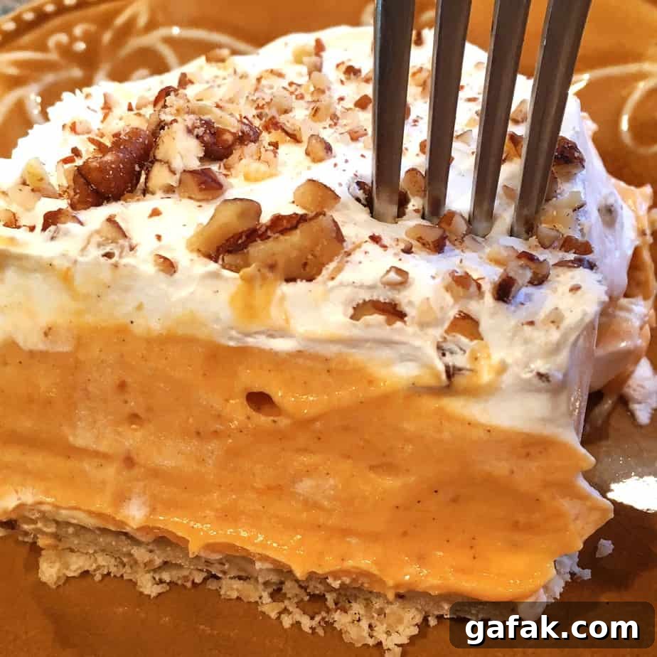 Creamy Layered Pumpkin Dessert with Gingersnap Crust 2 pumpkin pie whipped cream and nuts