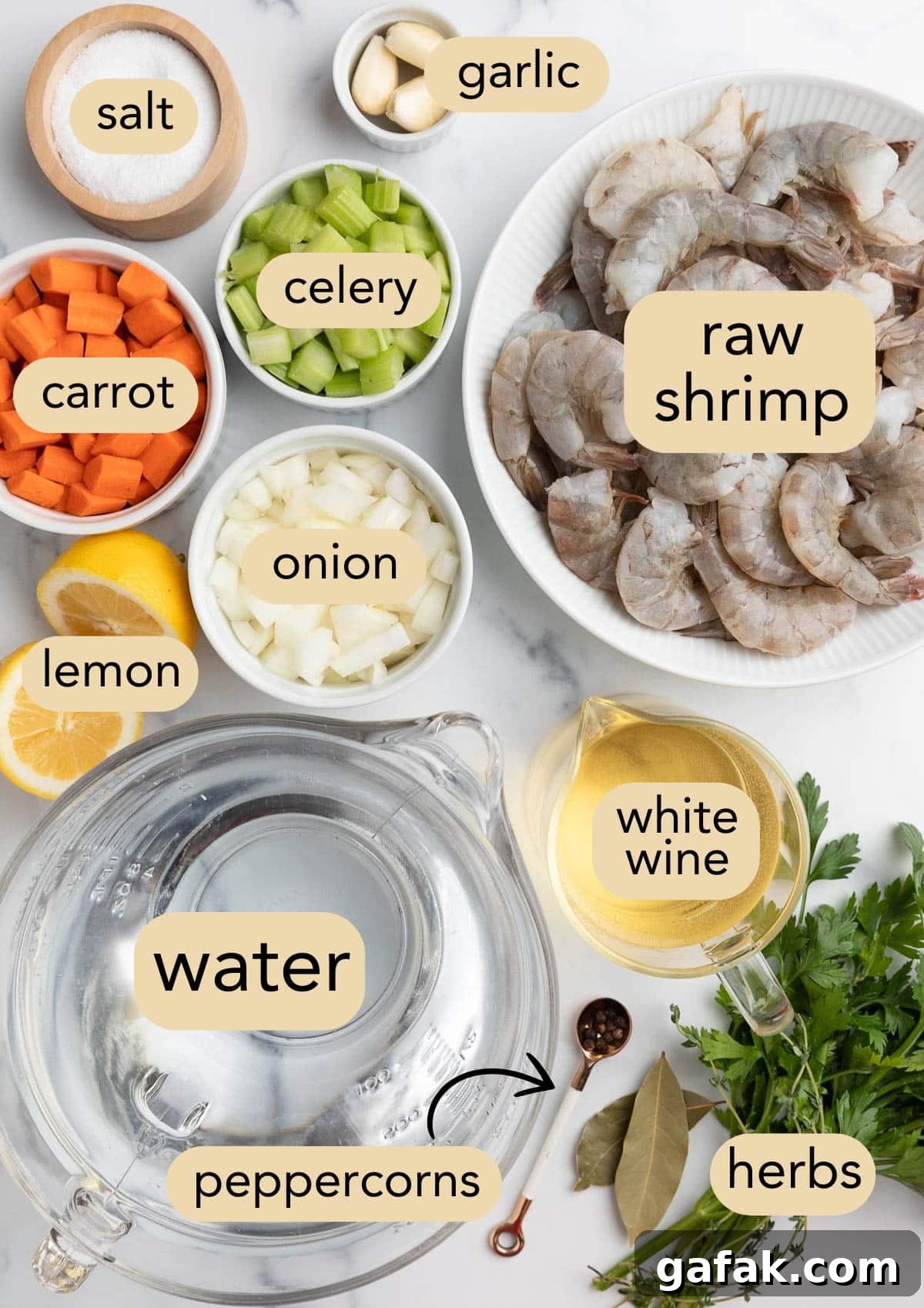 How to Poach Shrimp Perfectly Every Time 3 overhead photo of ingredients needed to poach shrimp in a court bouillon