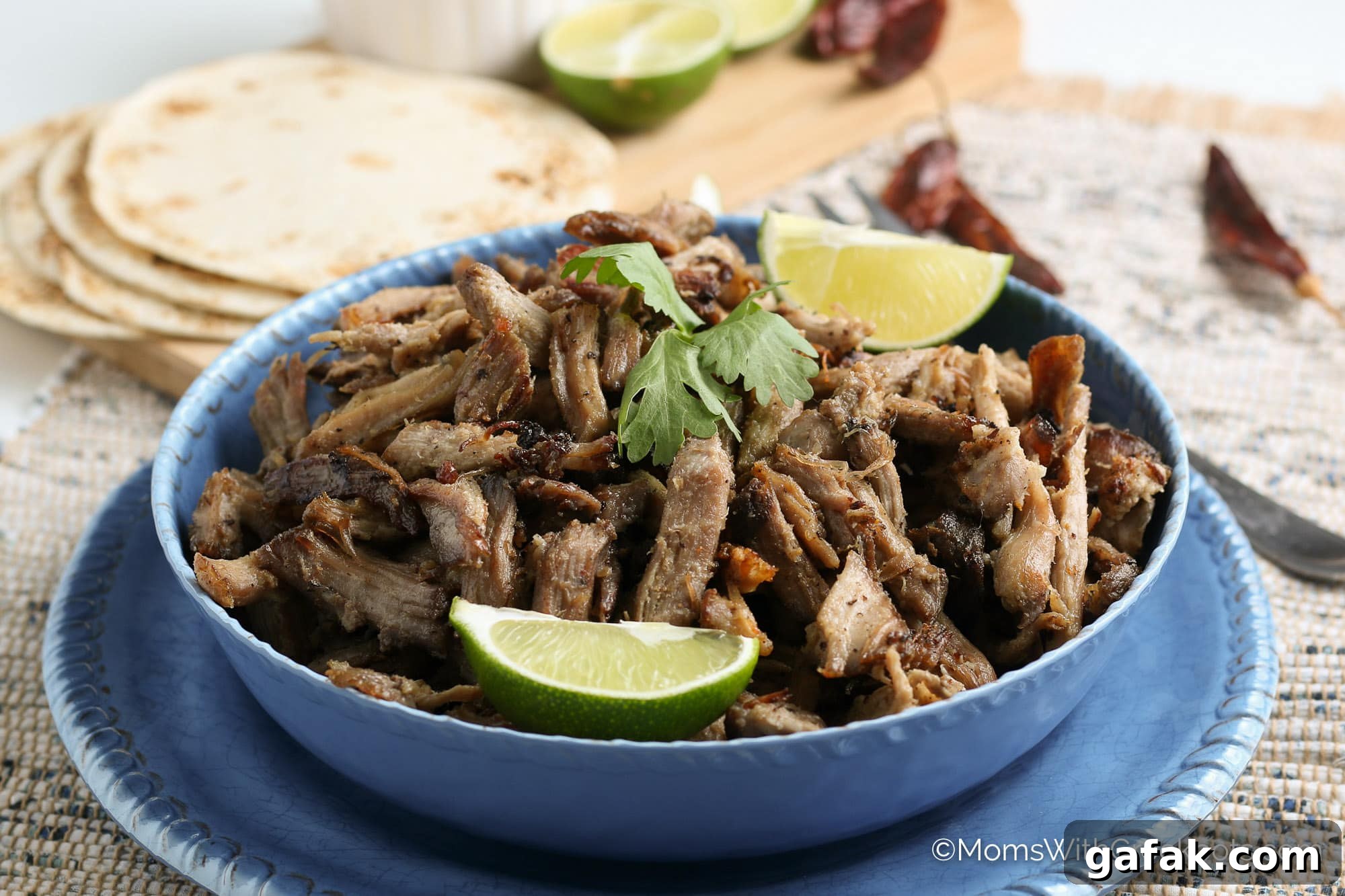 Slow Cooker Carnitas in a blue bowl