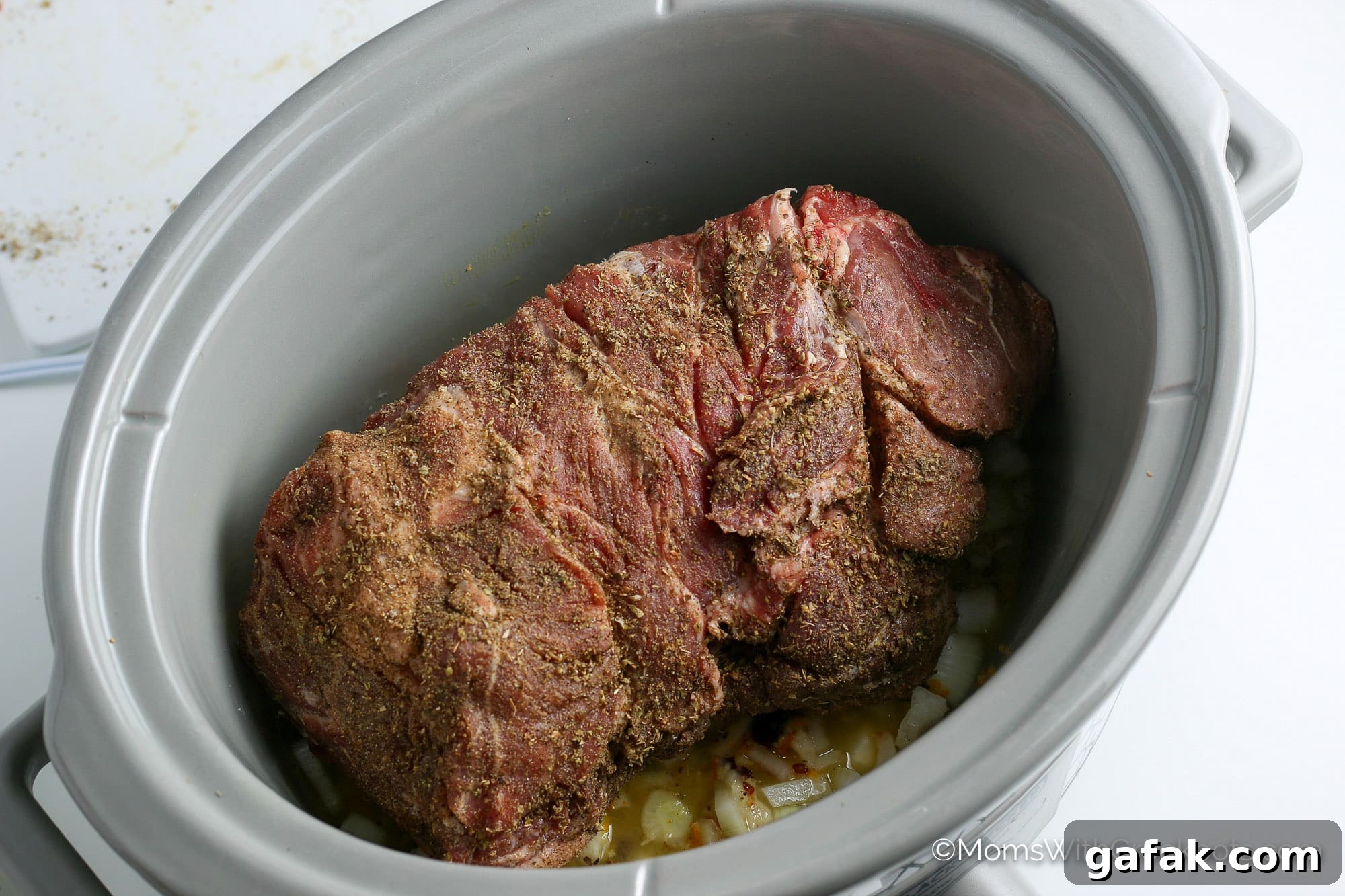 pork in slow cooker with seasonings