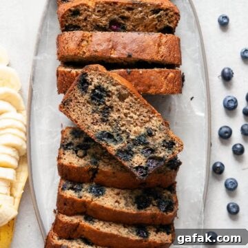 Healthy oil-free blueberry banana bread, made with almond and oat flour.