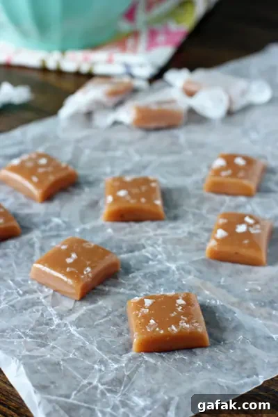 Unwrapped Bourbon Caramels on parchment paper.