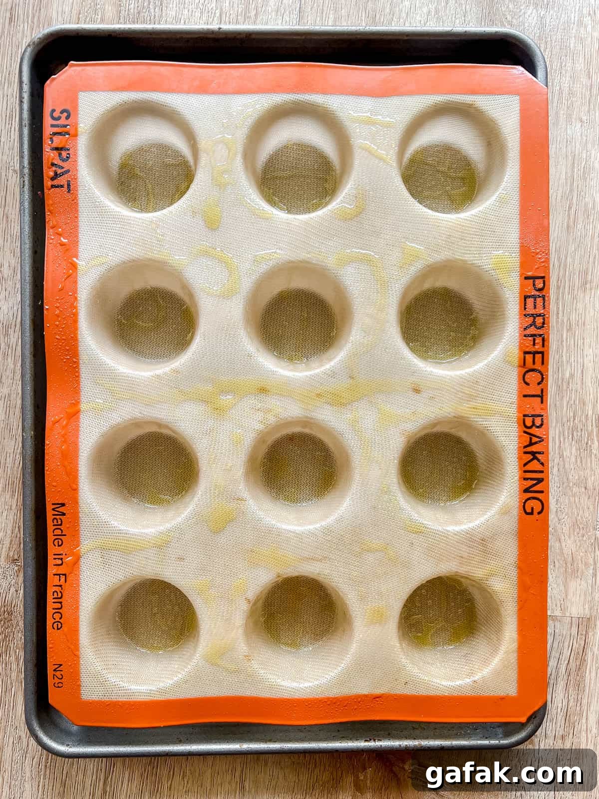 Silicone pan freshly greased.