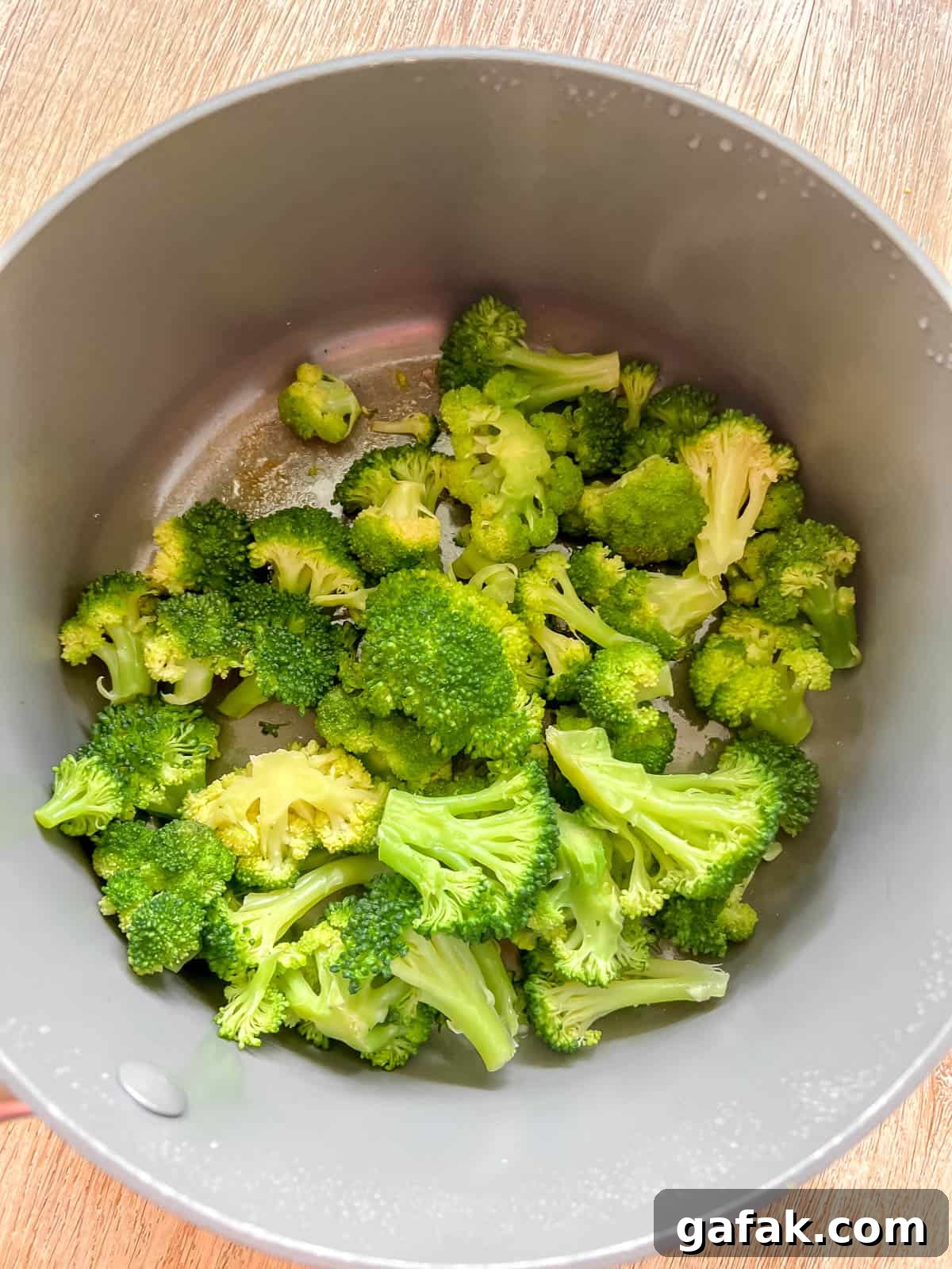 Steamed broccoli in a pan.