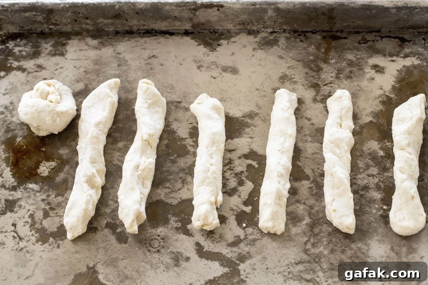 Biscuit dough stretched into ropes.