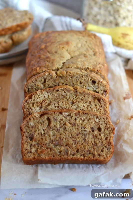 Sliced banana bread on parchment paper