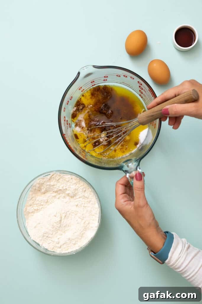 whisking browned butter with sugar