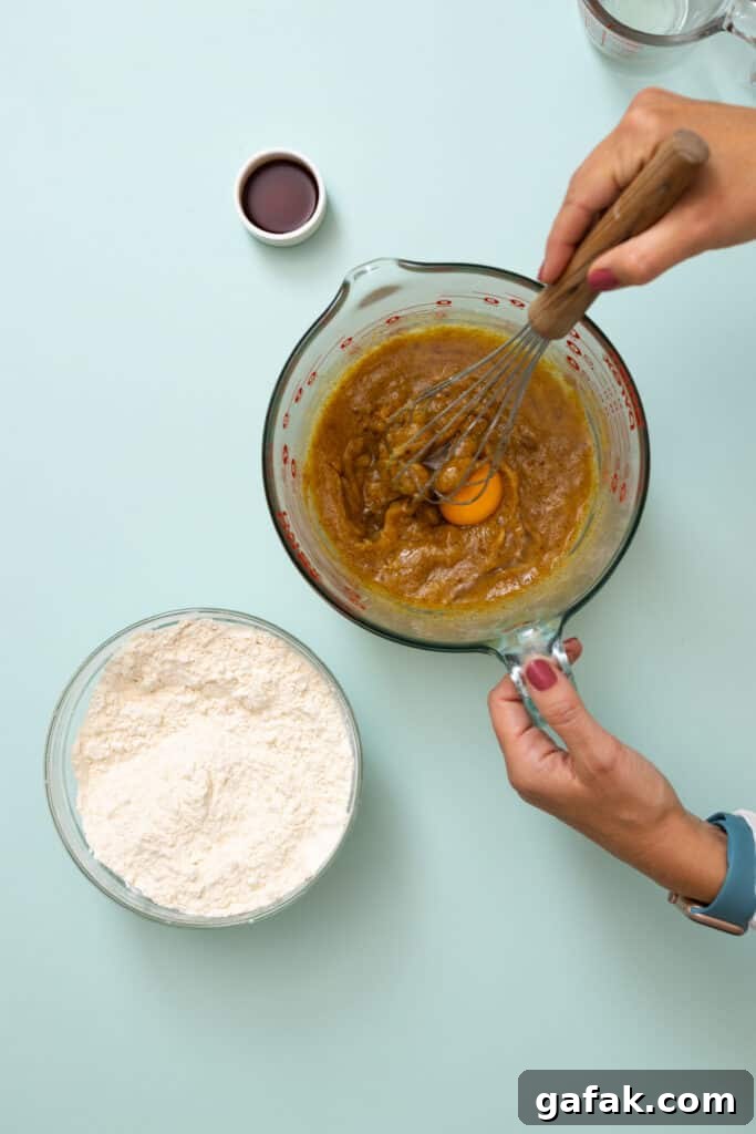 whisking browned butter, sugar & eggs