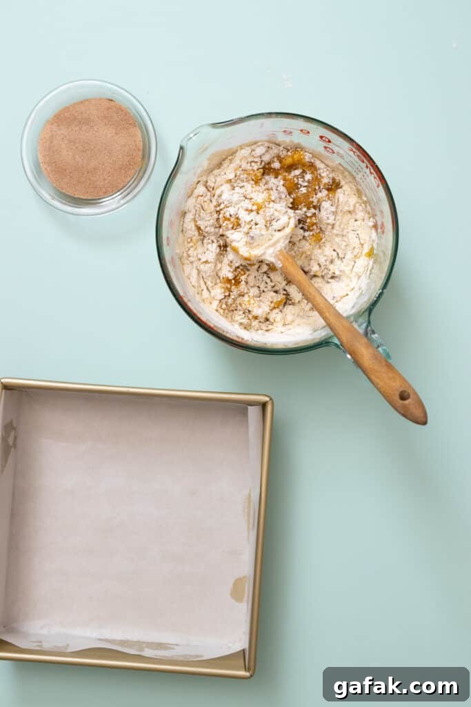 folding dry ingredients into Blondie batter