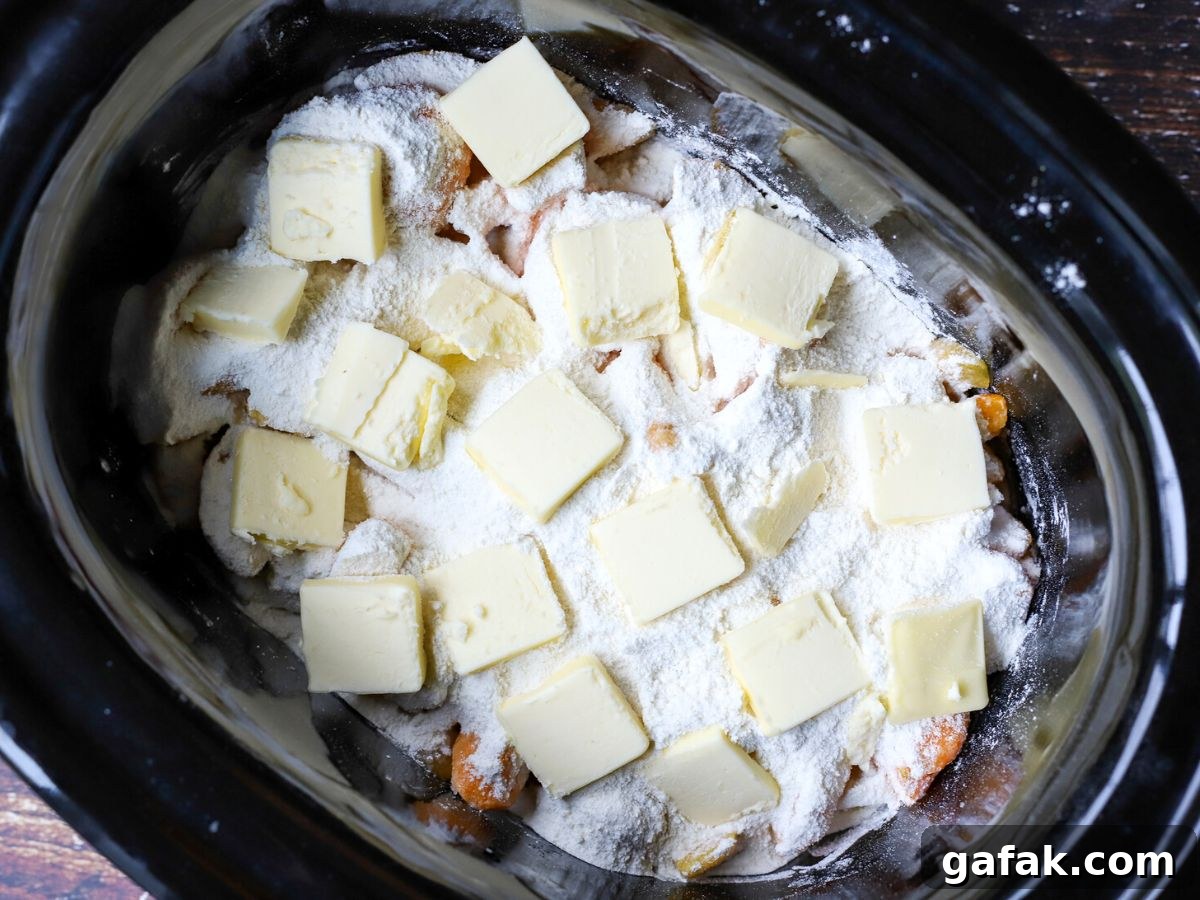 peaches with flour, sugar, and butter in crockpot