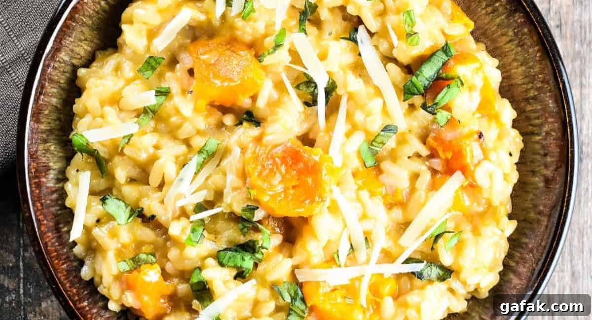 Overhead image of roasted butternut squash risotto with garnish. 