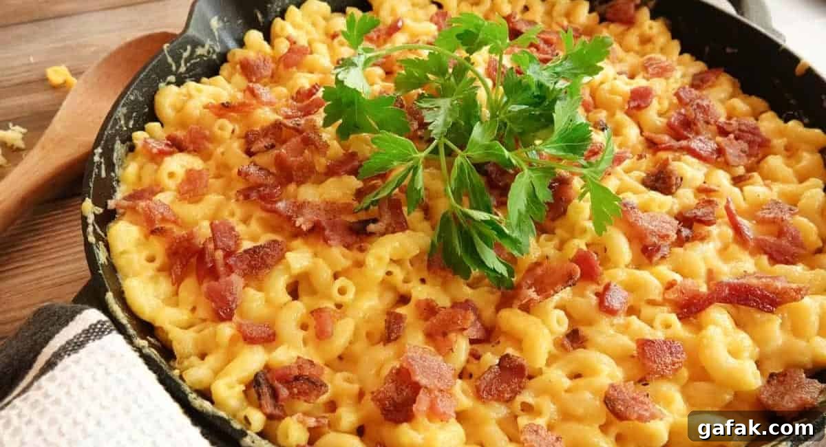 Overhead image of smoked mac and cheese with garnish. 