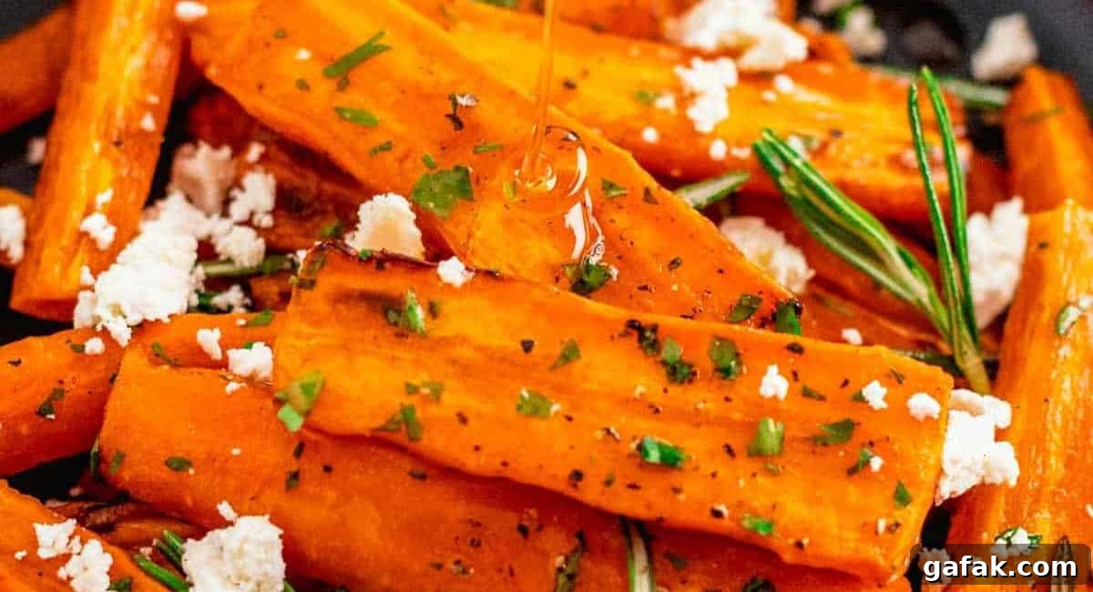 Up close image of air fryer carrots (glazed) with garnish. 