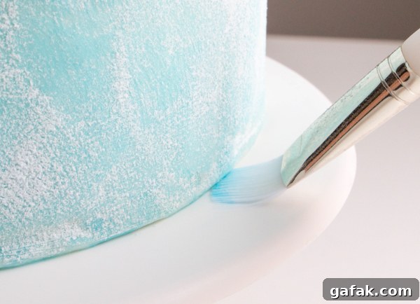 Sueded Buttercream Cake with Sprinkle Snowflakes | by Erin Gardner for TheCakeBlog.com #cake #winter #christmas #christmasdessert