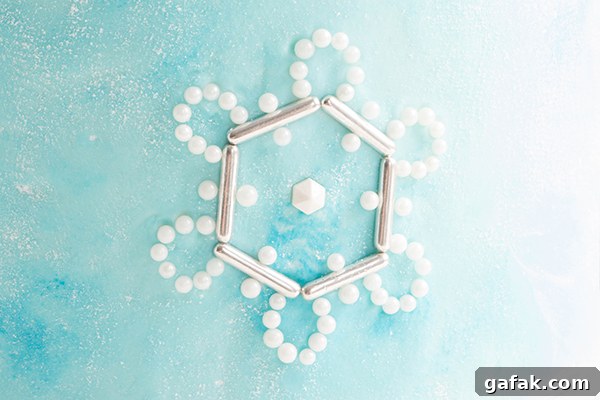 Sueded Buttercream Cake with Sprinkle Snowflakes | by Erin Gardner for TheCakeBlog.com #cake #winter #christmas #christmasdessert