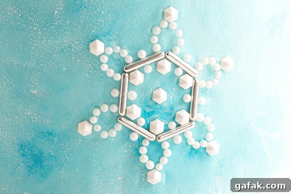 Sueded Buttercream Cake with Sprinkle Snowflakes | by Erin Gardner for TheCakeBlog.com #cake #winter #christmas #christmasdessert