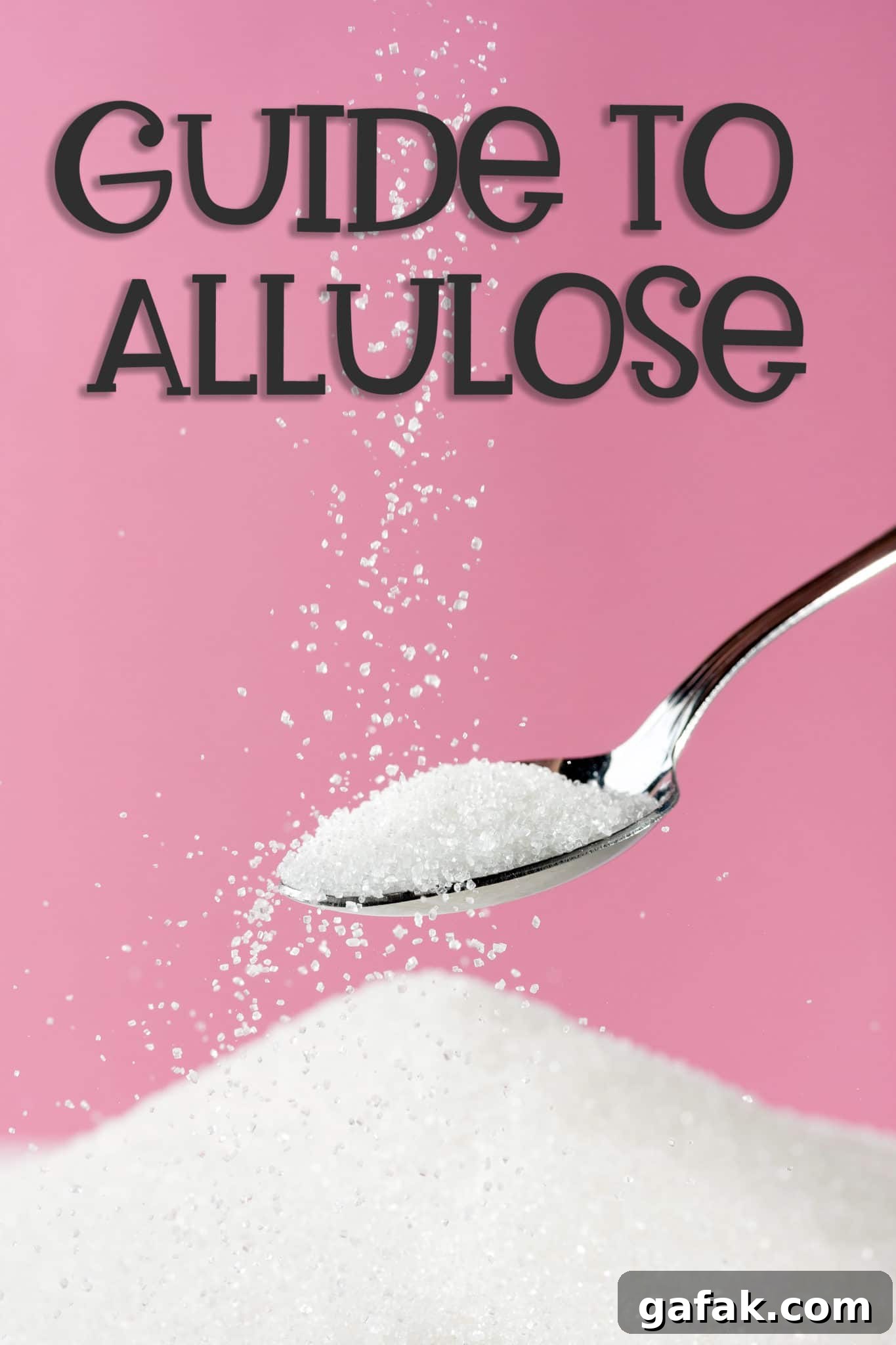 Granular allulose being sprinkled from a spoon.