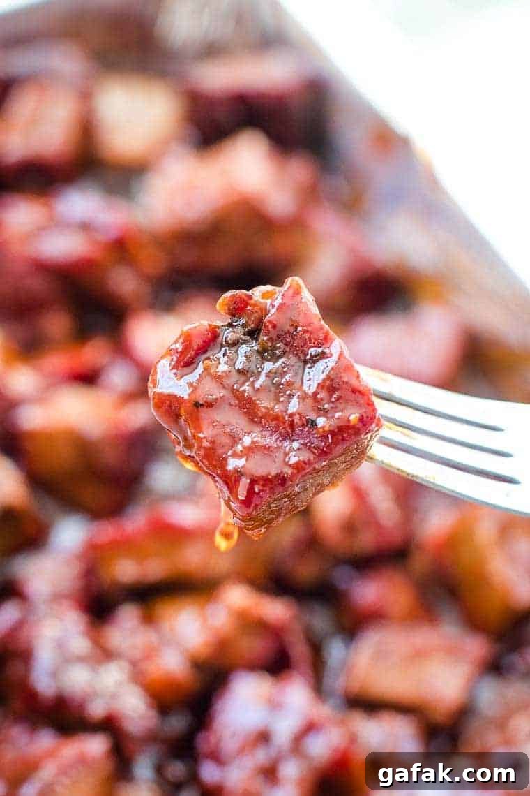 Affordable Burnt Ends Recipe: Crispy Smoky Beef Without Pitmaster Gear 4 Chuck Roast Burnt Ends on fork