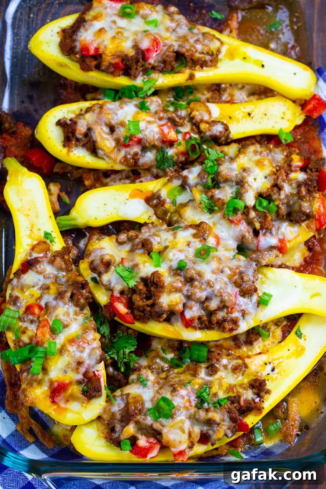 Stuffed Yellow Squash in baking dish.