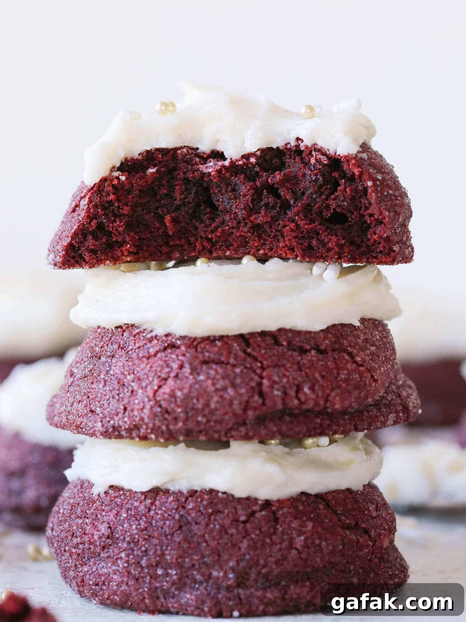 Stacked red velvet cookies deep red in color.
