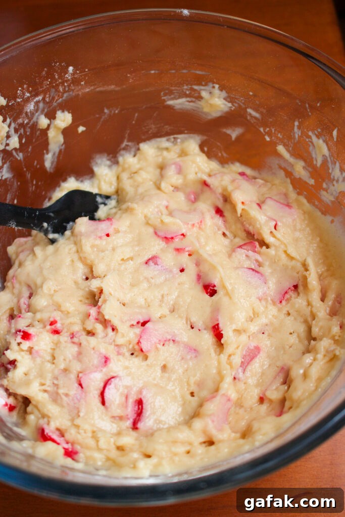 Folding rhubarb into batter