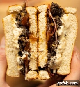 close up overhead shot of open haggis toastie showing filling
