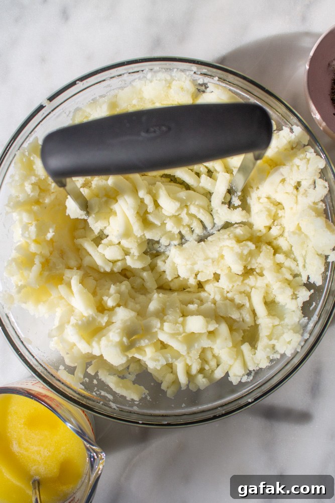 mashing potatoes