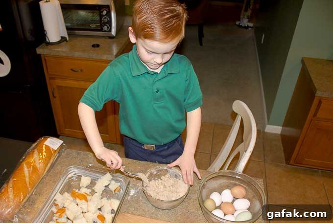 child helping to make bread pudding