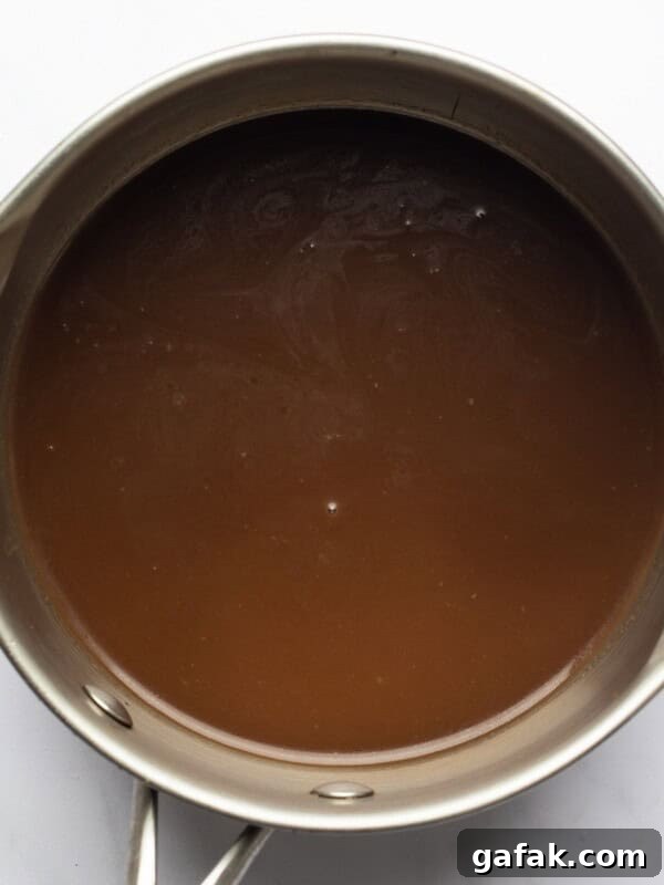 mushroom gravy served in a metal pot.