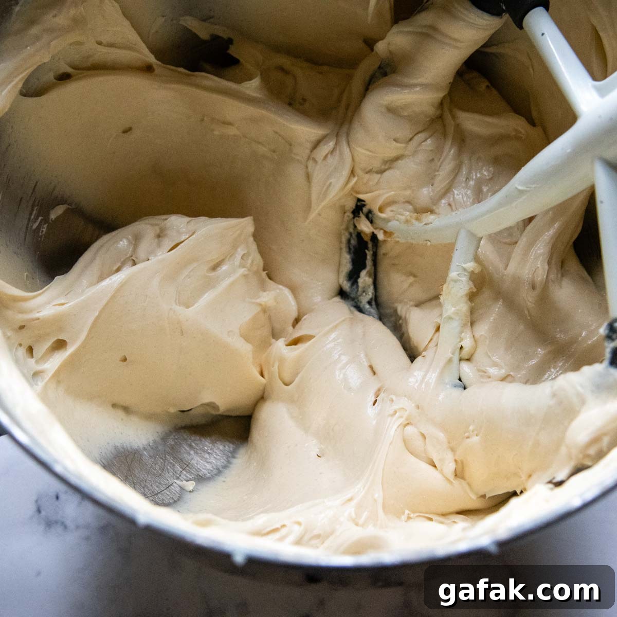 the cream cheese beaten with sugars.