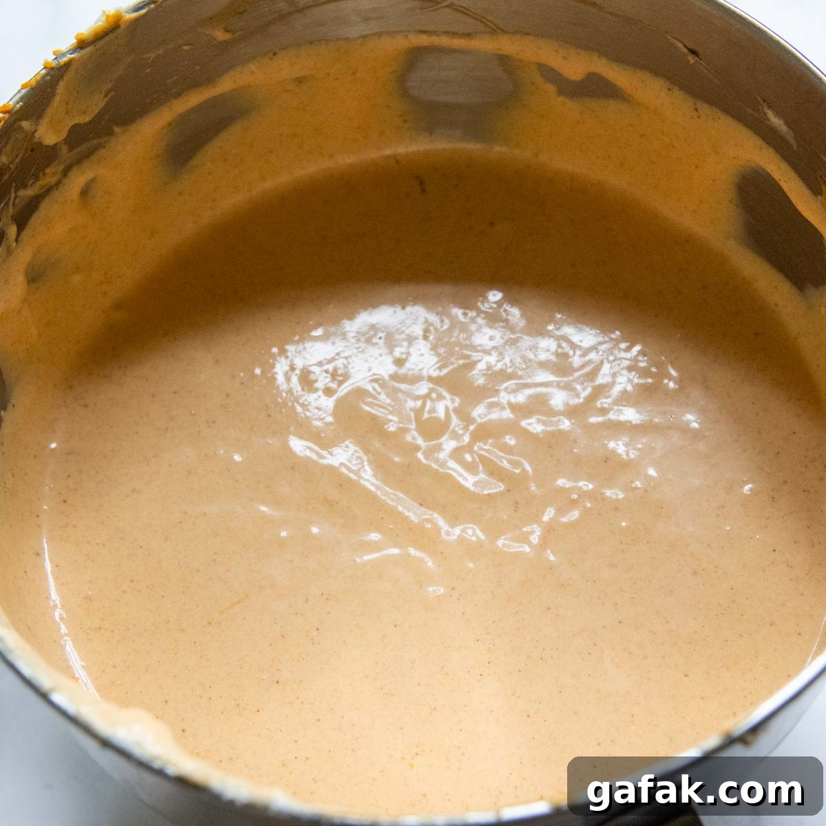 the cheesecake batter in a bowl after mixing.