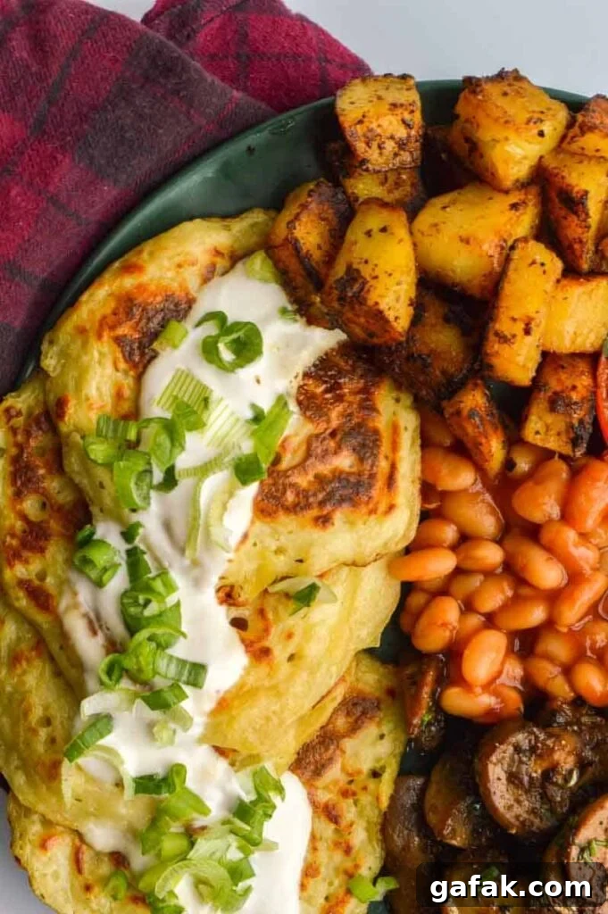 A full Irish breakfast with potato pancakes, beans and mushrooms