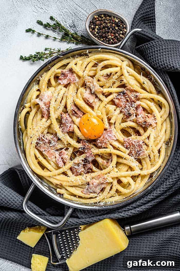 Traditional italian dish spaghetti carbonara with leftover smoked ham