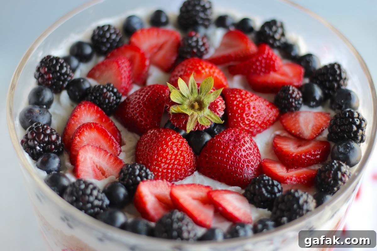 Paleo Triple Berry Trifle (AIP) - this red, white, and blueberry dessert is perfect for your patriotic holidays, or for just about anything! | fedandfulfilled.com