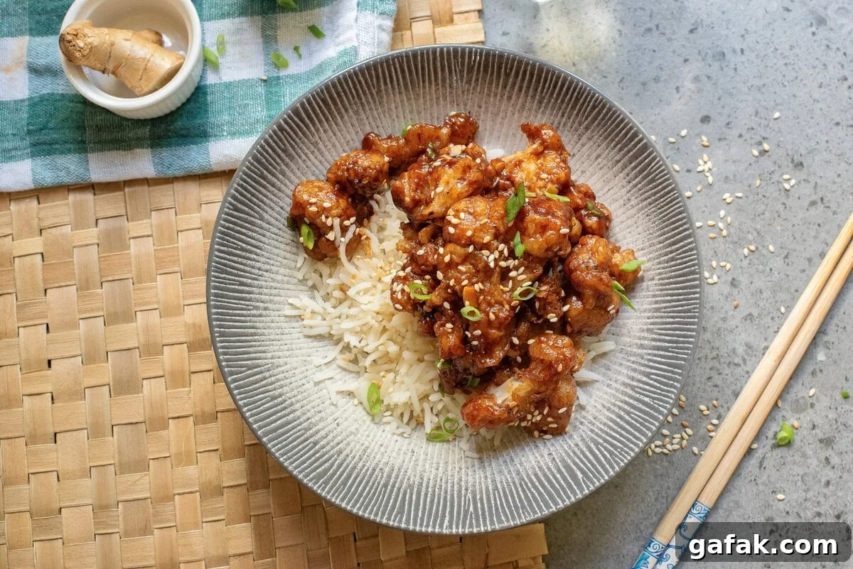 An overhead image of gobi manchurian over rice.