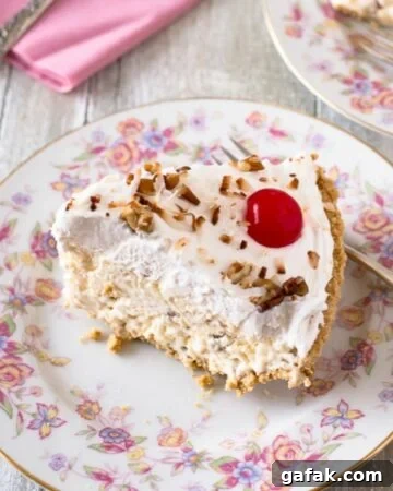 A slice of creamy Million Dollar Pie of a dessert plate.
