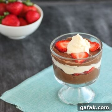 Paleo Chocolate-Strawberry Parfait Recipe for Clean Eating 5 creamy chocolate pudding layered with cream and berries.