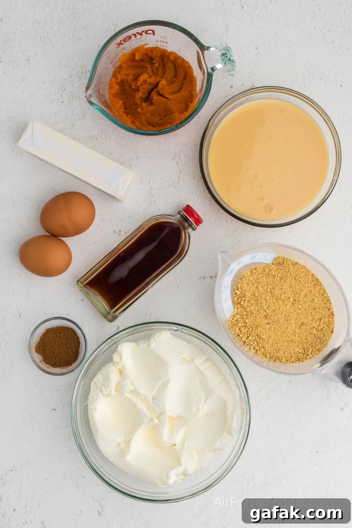Ingredients needed to make pumpkin cheesecake in the air fryer. 