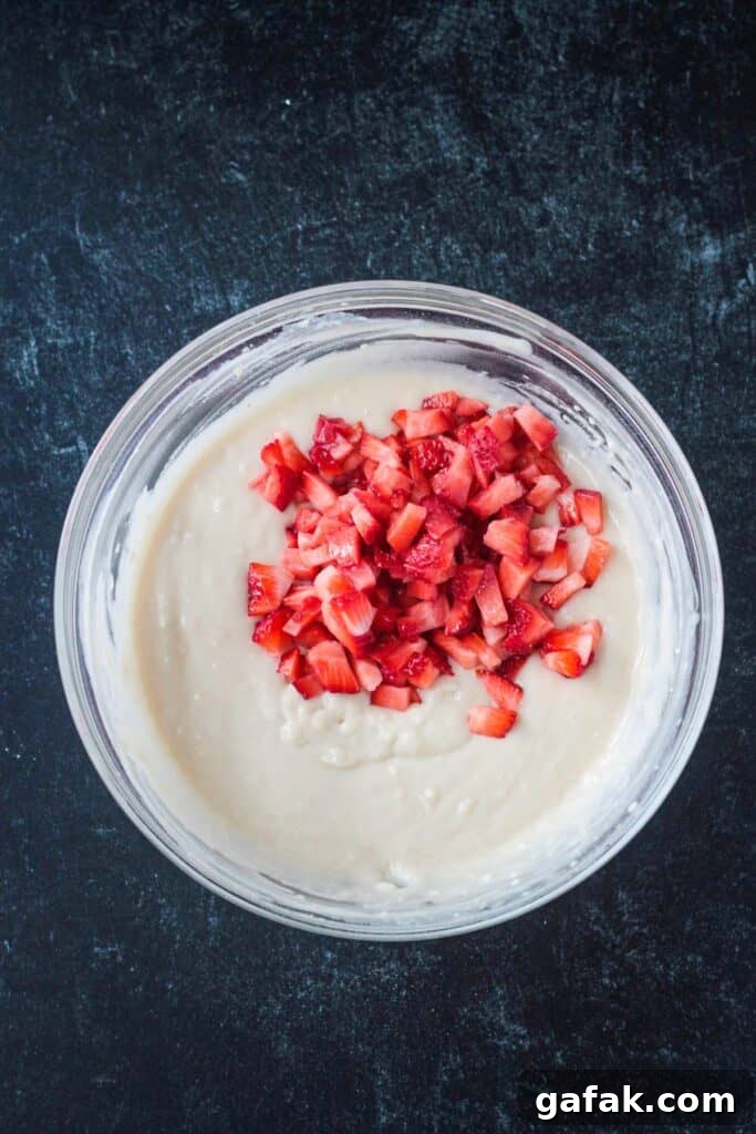 Diced fresh strawberries added to the batter.