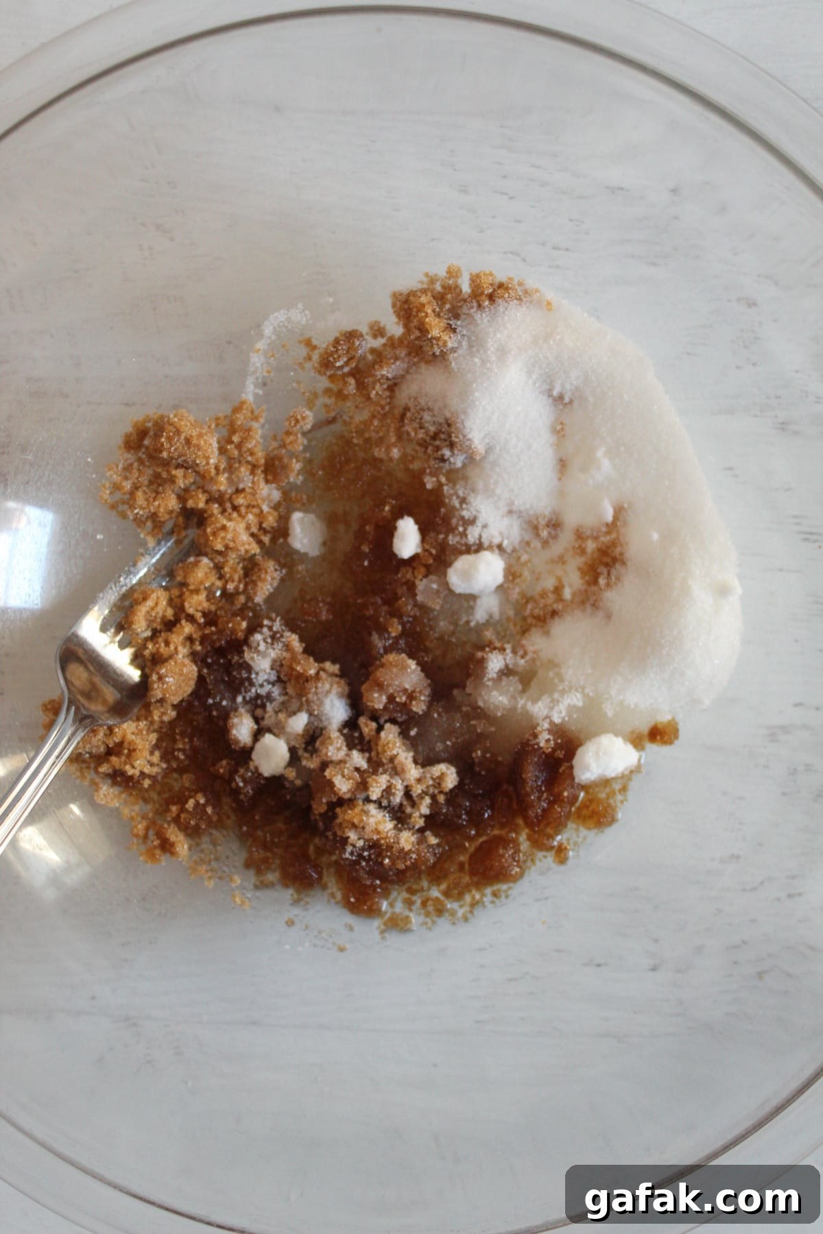sugars added to a large glass mixing bowl