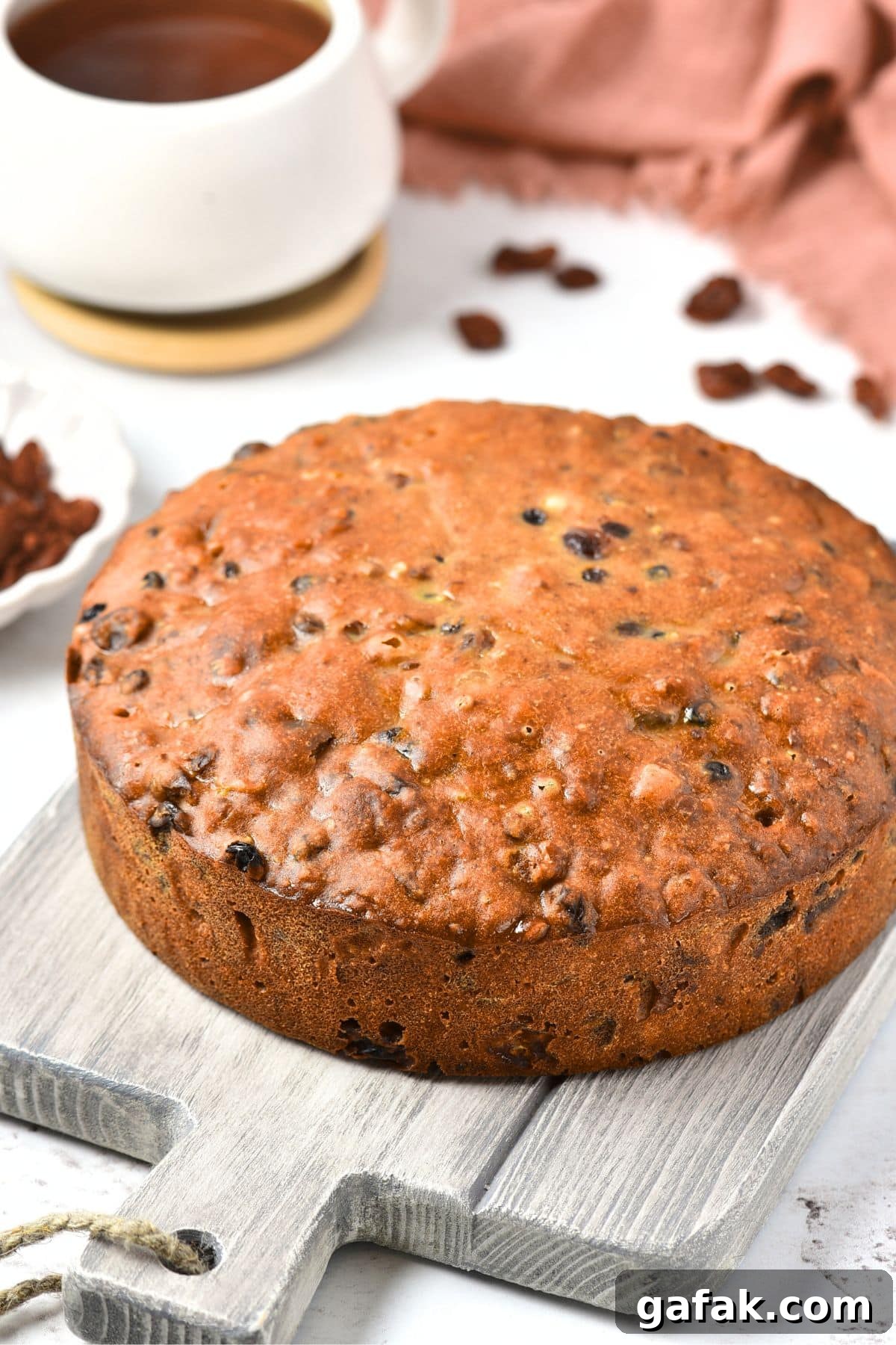 Homemade Fruit Cake Recipe Homemade fruitcake on wooden board