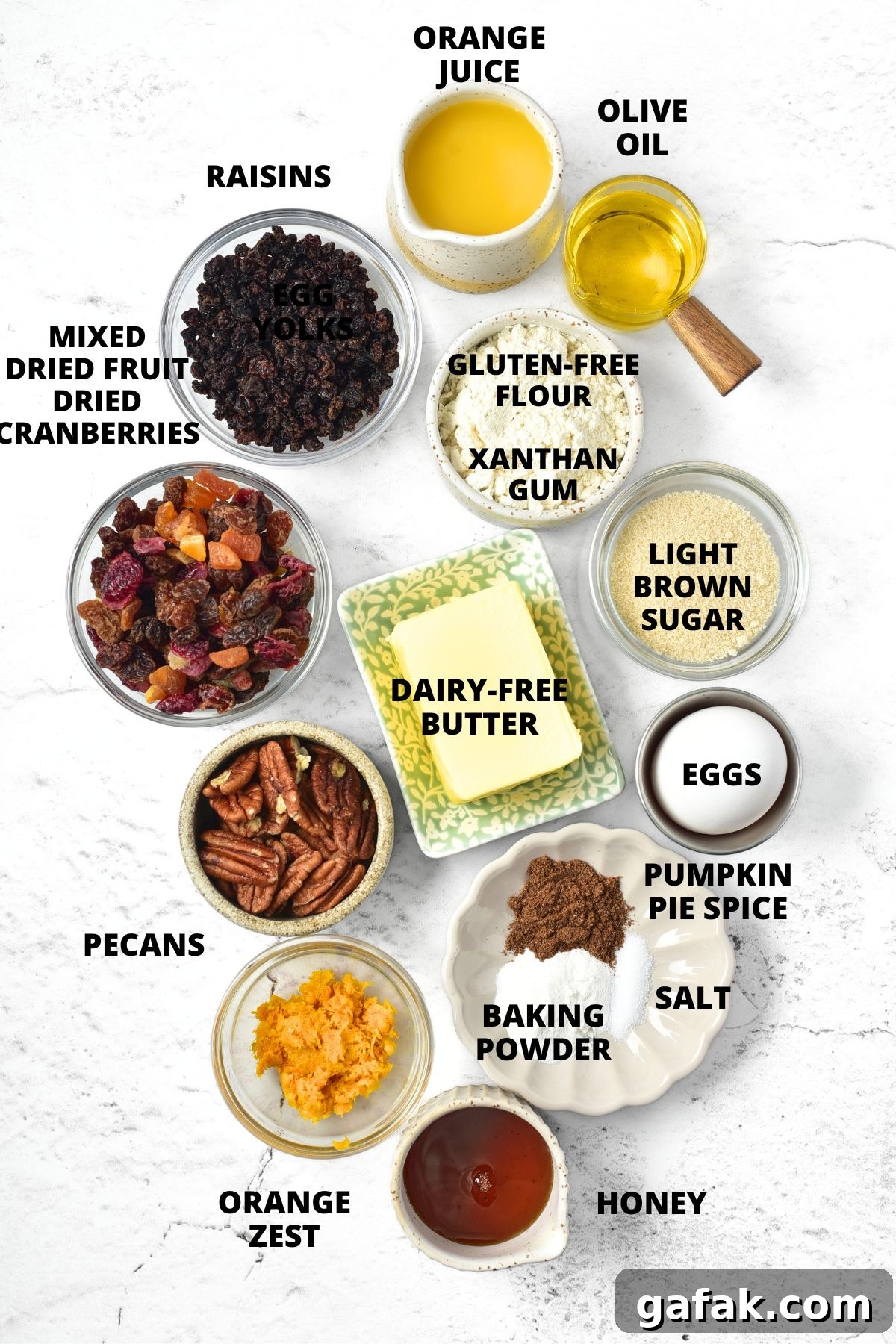 Easy Gluten-Free Fruit Cake Recipe (Dairy-Free) Ingredients for making gluten-free fruit cake recipe laid out on marble board.