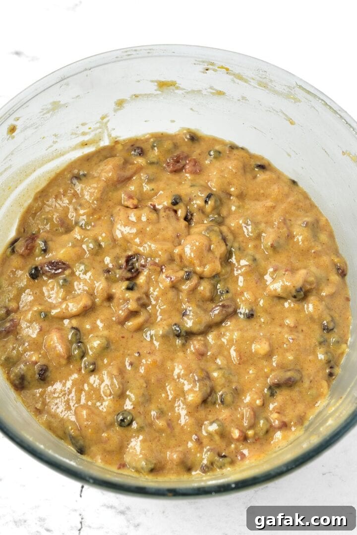 Easy Gluten-Free Fruit Cake (Dairy-Free) Fruit cake batter in mixing bowl