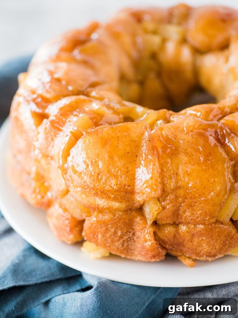 apple cinnamon monkey bread on a white plate