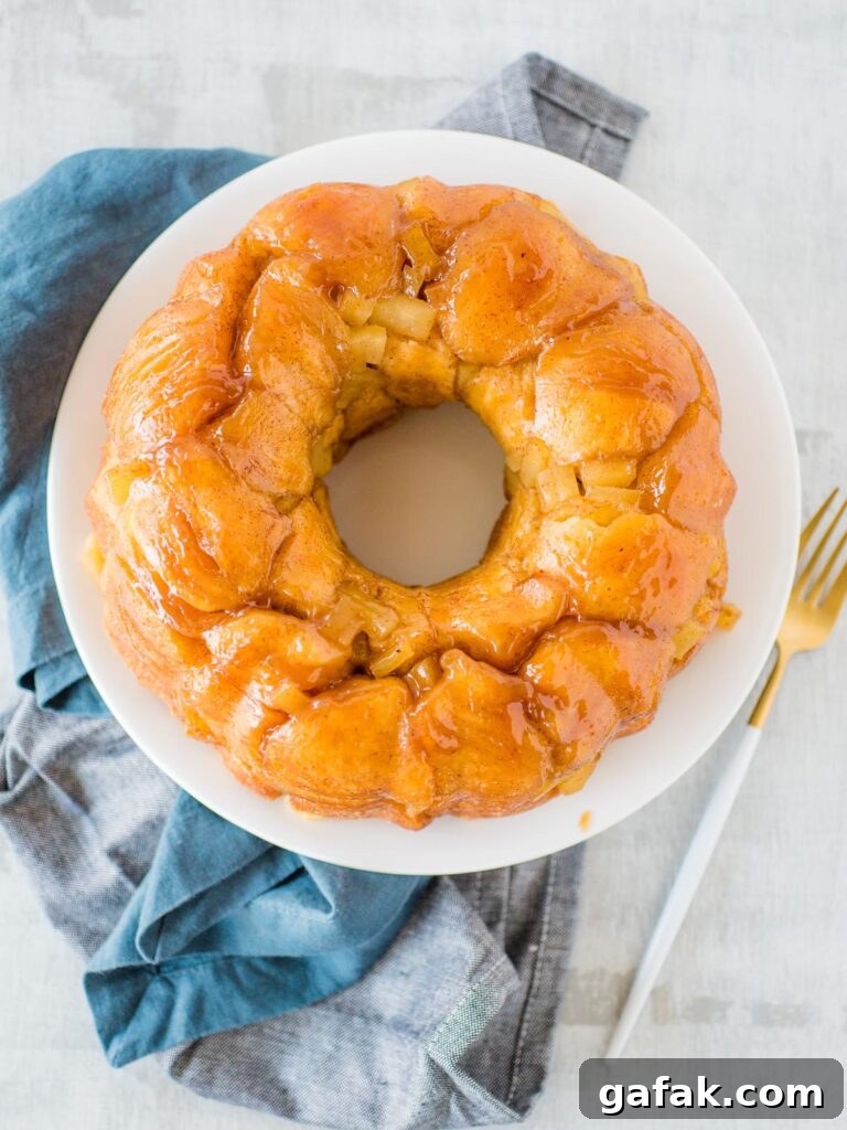 apple cinnamon monkey bread on a white plate
