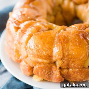 apple cinnamon monkey bread on white plate