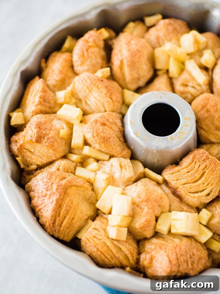 cooked apple cinnamon monkey bread in a Bundt pan