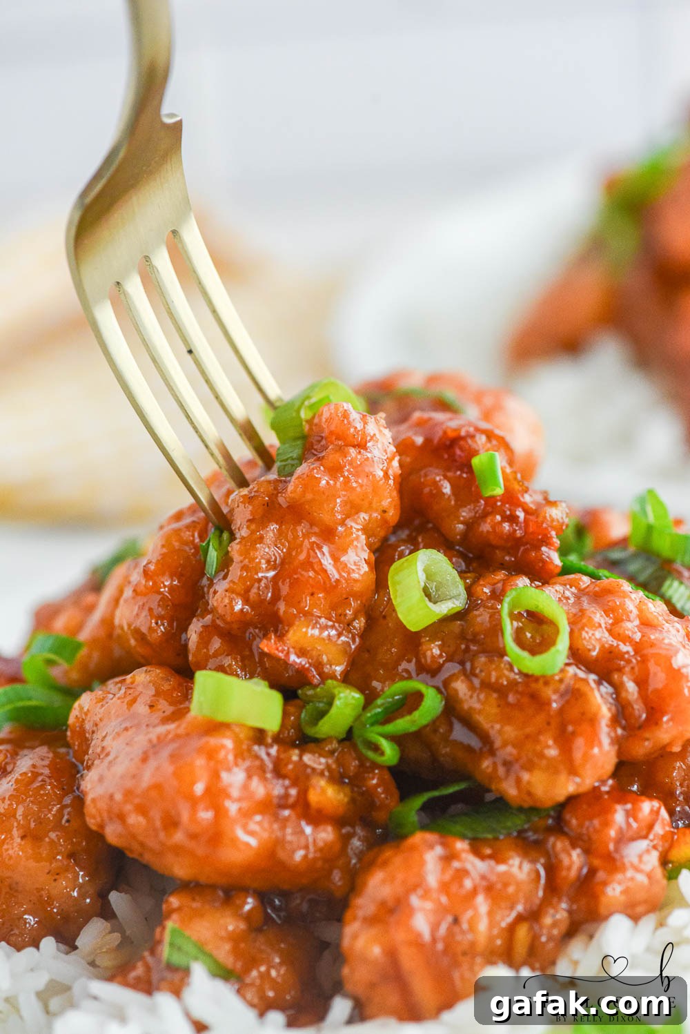 Crispy Orange Chicken Recipe with Tangy Mandarin Sauce 9 Orange Chicken that's made with 4 ingredients! Yummy bites of chicken covered in a sweet and flavorful orange sauce. 30-minute dinner recipe!