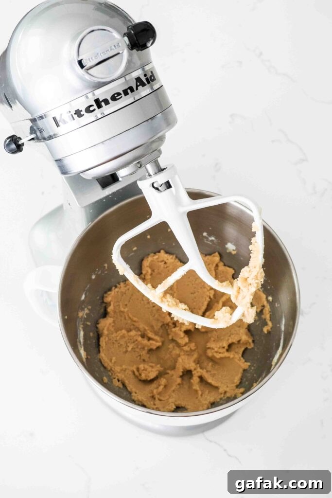 Creamed butter and sugar in a stand mixer bowl.